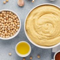 Hummus Classic 10oz · Ingredients: Garbanzo Beans ,Tahini (Sesame Paste), Canola OiL, Olive Oil, Garlic, Salt, Cit...