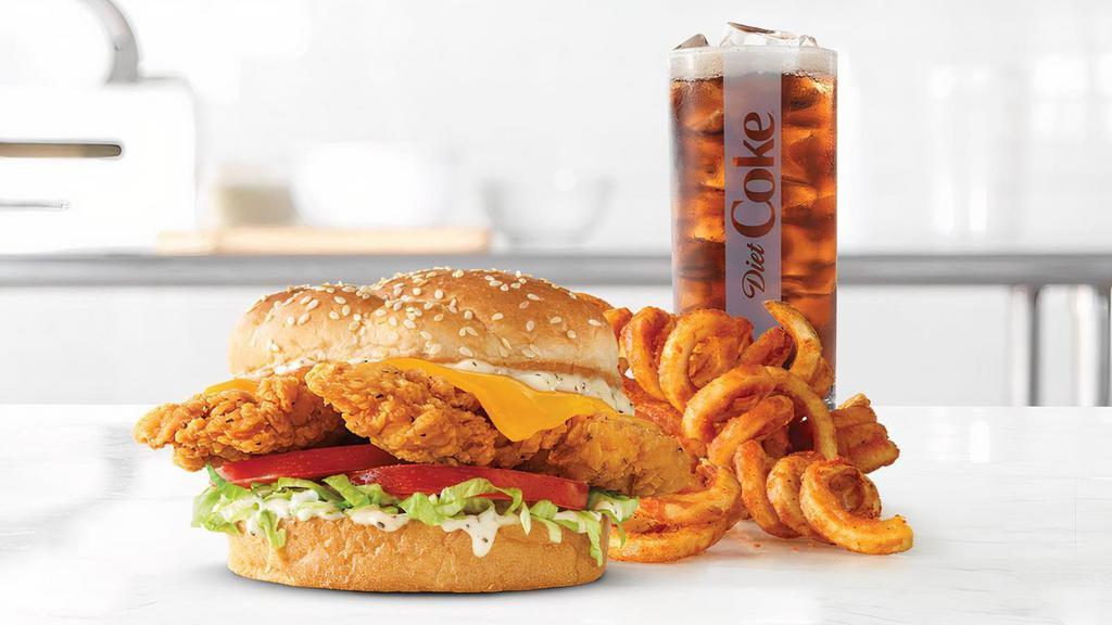 Chicken Cheddar Ranch · Two fried chicken tenders with cheddar cheese, shredded lettuce, tomato, and parmesan peppercorn ranch on a toasted sesame seed bun. Visit arbys.com for nutritional and allergen information.