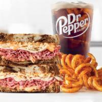 Reuben · Thinly sliced corned beef with melted Swiss cheese, tangy sauerkraut and creamy Thousand Isl...