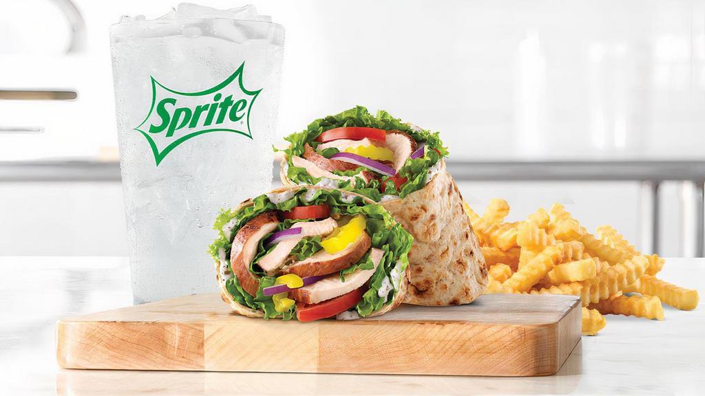 Creamy Mediterranean Chicken Wrap · Slow-roasted chicken breast with cool and creamy tzatziki sauce, banana peppers, green leaf lettuce, tomato, and red onion in an artisan wheat wrap. Visit arbys. com for nutritional and allergen information.