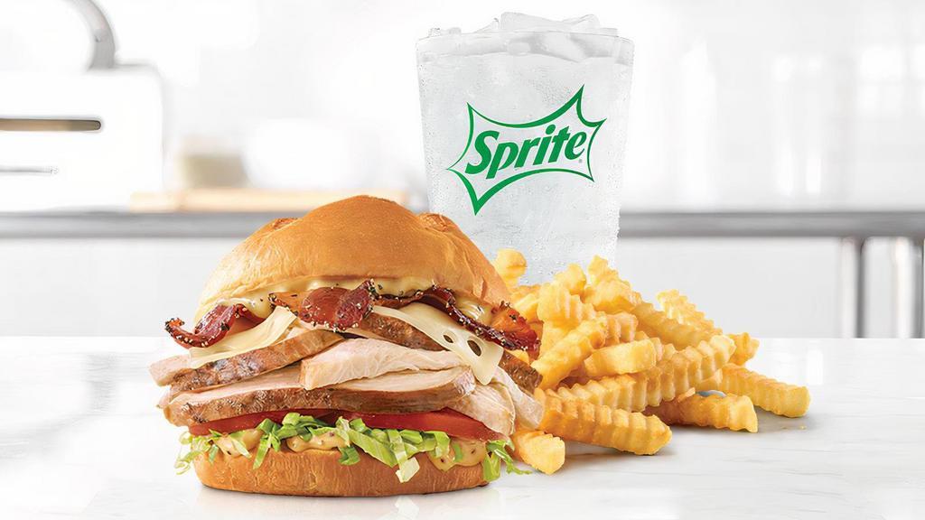 Roast Chicken Bacon & Swiss · Slow roasted chicken with bacon, Swiss cheese, lettuce, tomato and honey mustard on a toasted specialty bun. Visit arbys.com for nutritional and allergen information.