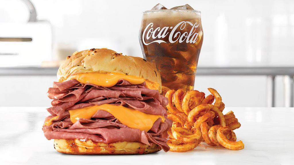 Half Pound Beef 'N Cheddar · A half pound of thinly sliced roast beef, with warm cheddar sauce and zesty red ranch sauce on a toasted onion roll. Visit arbys.com for nutritional and allergen information.