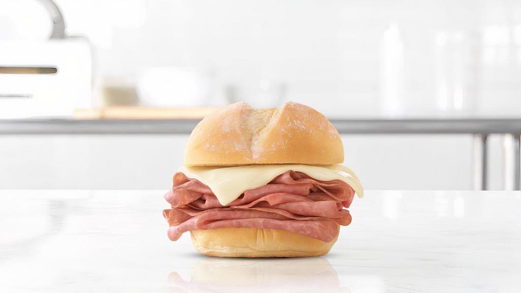 Roast Beef Slider · Thinly sliced roast beef and Swiss cheese on a warm slider style bun. Visit arbys. com for nutritional and allergen information.