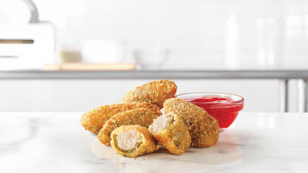 Jalapeño Bites® (5 Ea.) · Spicy jalapeño halves filled with melted cream cheese, served with a side of Bronco Berry Sauce. Visit arbys.com for nutritional and allergen information.