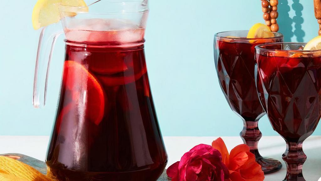 Kasa Sangria · Housemade Sangria with red wine, fresh fruits, spices and hibiscus.