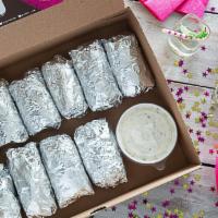 Naan Stop Party Pack · Includes 10 rolls individually wrapped and served in a Kasa box with a side of cucumber rait...