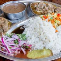 Thali Plate · Comes with your choice of two entrees and includes rice, daal (lentils), chutneys, marinated...