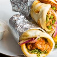 Naan Kati Roll · Flaky naan bread with your choice of filling plus chutneys and marinated onions and side of ...
