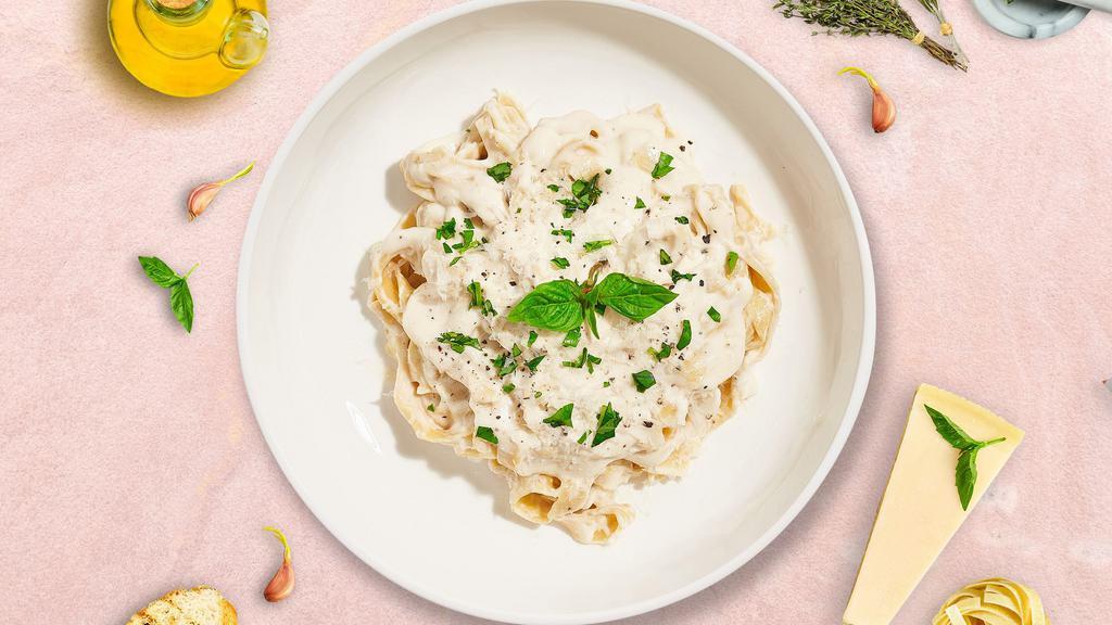 Amazing Alfredo Pasta (Fettuccine) · Fresh fettuccine pasta served with a creamy alfredo sauce, roasted garlic, and parmesan cheese. Served with a side of garlic bread.