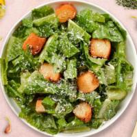 Caesar's Luck Salad · Romaine lettuce, house croutons, and parmesan cheese tossed with Caesar dressing.
