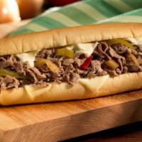 Steak Philly · Thinly sliced steak with provolone cheese, hot cherry peppers, caramelized onion and molten ...