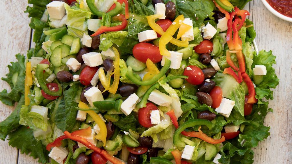 Greek Salad (Gluten-Free and Vegetarian) · Gluten-free, vegetarian. Romaine lettuce, tomatoes, cucumbers, kalamata olives, and shredded feta cheese topped with house vinaigrette.