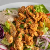 Fattoush Salad w/Hummus & Chicken · Lettuce, tomatoes, cucumbers,  pita chips, topped with house vinaigrette, chicken shawarma &...