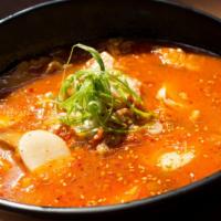 7. Kimchi Jjigae Soup (Korea) · Spicy. Spicy chicken broth, pork belly, kimchi, Korean rice cake, scallions.