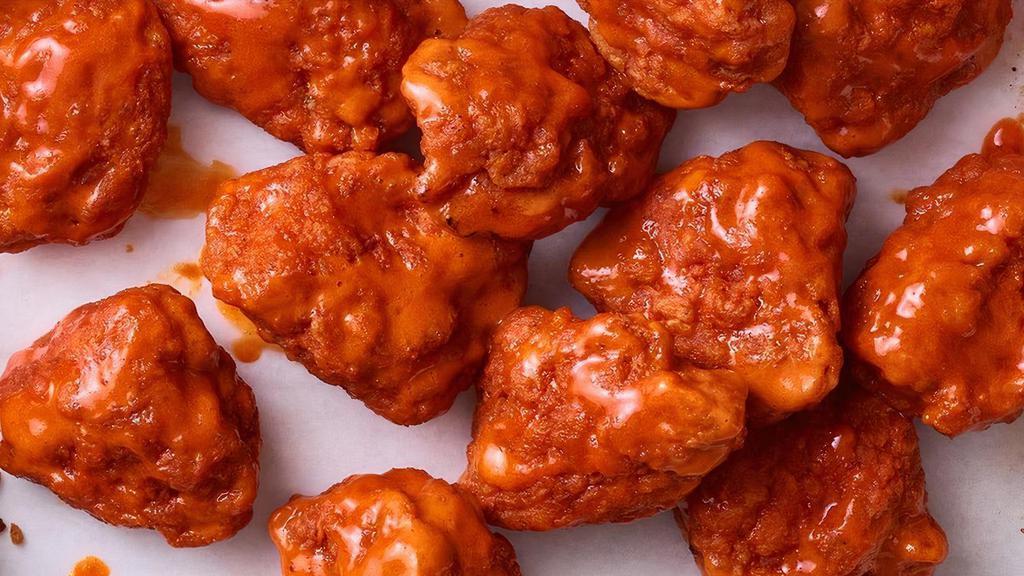Boneless Wings · Delicious breaded pieces of tender boneless chicken tossed in your choice of sauce. Served with celery and your choice of Bleu cheese or house-made ranch dressing.