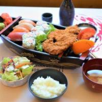 Tonkatsu(deep fried pork ) Boat · A one person boat.
Served with salad, rice,
sushi combination,