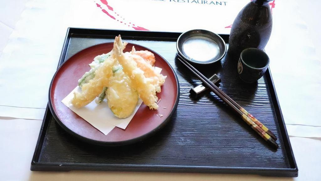 Tempura · Sample photo, actual food may vary.
 total 10 pieces of veggie and 4 pieces of shrimps Shrimp and vegetable tempura