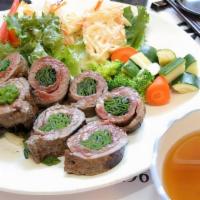 Beef Negimaki · Green onion wrapped in beef with teriyaki sauce.