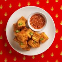 Spicy Fried Tofu · Deep fried tofu, served with sweet & sour sauce.