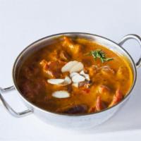 Chicken Masala · Boneless chicken cooked with ginger, onion, fresh herbs, and spices.