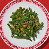 Chinese String Beans · Spicy chili sautéed with string beans in a chili garlic brown sauce.