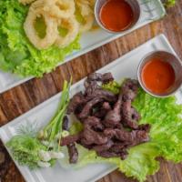 Nuer Dad Deaw · Deep-fried marinated beef served with Sriracha dipping sauce