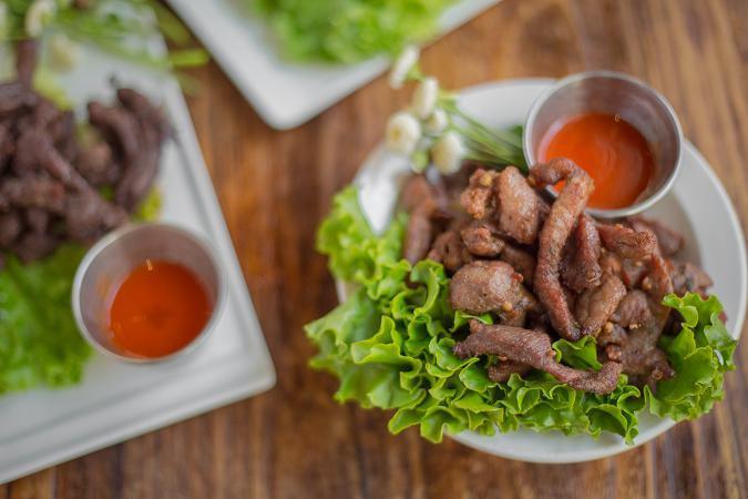 Moo Dad Deaw · Deep-fried marinated pork served with Sriracha dipping sauce