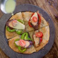 Keaw Wan Roti · Pan-fried Indian bread with bell peppers, eggplant, cherry tomatoes, and basil with green cu...