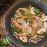 Tom Klong Talay · Our hot and sour Thai-Cambodian style soup, seasoned with combination seafood, tamarind sauc...