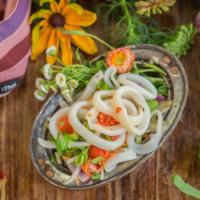 Yum Pla Muk · Quickly boiled calamari seasoned with onions, carrots, and cilantro in spicy lime dressing. ...