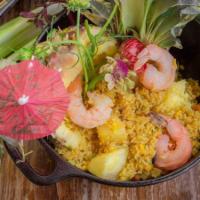 Pineapple Fried Rice · Yellow curry fried rice with prawns, pineapple, carrot, cashew nut, egg, raisin, and onions....