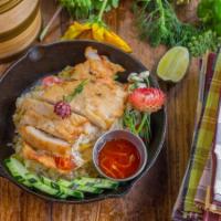 Kao Pad Gai Tod · Crispy fried chicken over fried rice served with house sauce