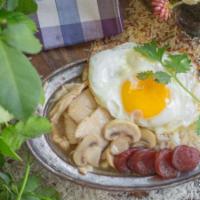 Kao Na Gai · Chicken in Thai brown gravy with Chinese sausage over rice and a fried egg