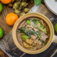 Rad Na Moo · Stir-fried wide rice noodle with pork, Chinese broccoli in Thai gravy sauce. Available subst...