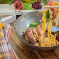 Ba Mee Ped · Boneless roasted duck over egg noodles with brown gravy sauce