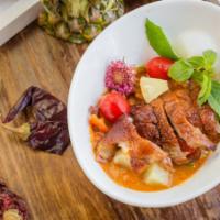 Kang Phed Ped Yang · Roasted duck, cherry tomatoes and pineapple in red curry base with a touch of coconut milk. ...