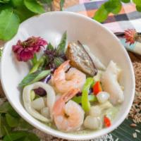 Kang Keaw Wan Talay · The combination of seafood with spicy green curry, coconut milk, bamboo shoot, and basil. Me...