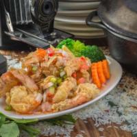 Goong Ma Kham (Tamarind Prawns) · Tamarind prawns. Light-fry prawns wok-tossed in spicy tamarind with crisped shallots and gar...