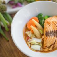 Choo-Chee Salmon · Flame-grilled salmon filet topped with Thai spiced choo-chee curry sauce
