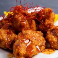 Honey Spicy Shichimi Karaage 七味蜂蜜から揚げ · -7 pc of soft skin traditional Japanese style fried chicken with spicy red pepper honey glaz...