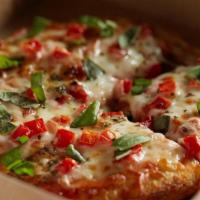 Margherita Pizza · Marinara Sauce, Shredded Cheese, Diced Tomato, Fresh Basil. . *Regular contains dairy & glut...