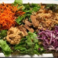 Super Salad · Organic seasonal lettuces, quinoa, hummus, baked tofu, carrots, purple cabbage, toasted pump...