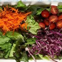 Seasonal Salad · Organic seasonal lettuces, carrots, purple cabbage, cherry tomatoes