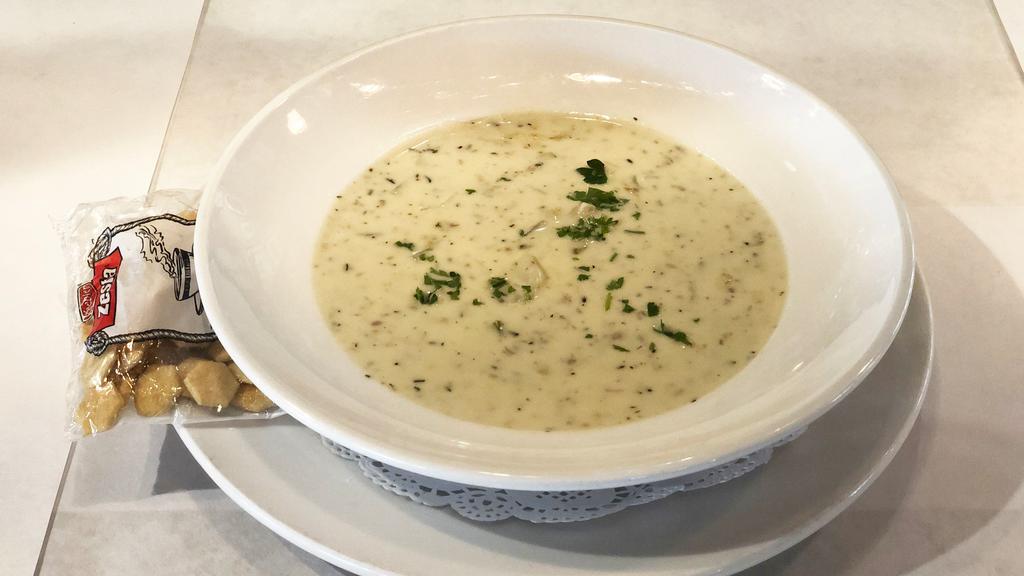 Clam Chowder (Now Served Daily!) · New England style chowder. Served with oyster crackers. *