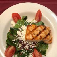Salmon Salad · Grilled fresh salmon over your choice of spring mix, spinach or Caesar salad.