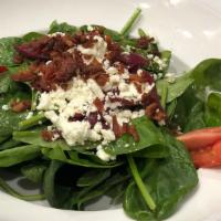 Spinach Salad · Baby spinach green, smoked bacon bits, cooked red onions, and feta cheese with Vito's balsam...