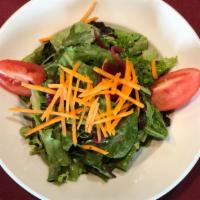 Mixed Green Salad · Spring mix with fresh carrots, tomatoes and cooked red onions.