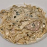Pollo Alla Picatta · Another traditional favorite! Chicken breast, lightly floured and prepared with capers, butt...