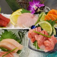 Sashimi Tasting* · chef's choice of six market selection