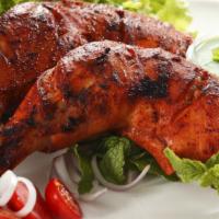 Charcoal Tandoori Chicken Whole (4 Pcs) · Whole chicken marinated in yogurt with special herbs, spices and cooked in tandoor - ( 4 pcs...